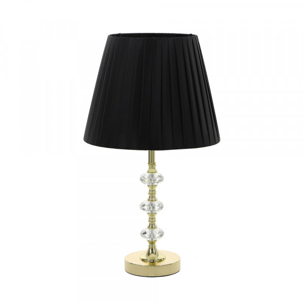 Złota lampa stołowa z czarnym abażurem
